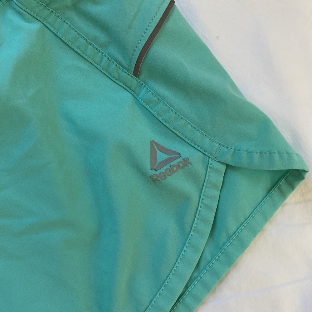 Turquoise Reebok athletic shorts - Picture 2 of 3